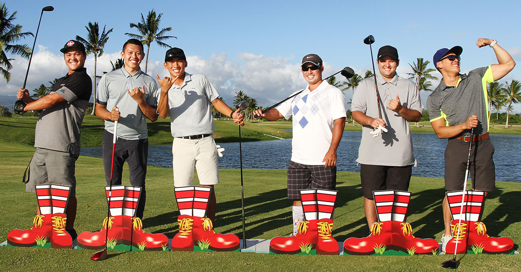 Golfers wearing Ronald McDonald shoes